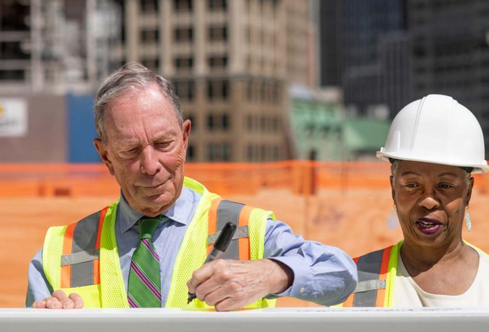 In June 2021, Mike Bloomberg joined Art Advisor Jawole Willa Jo Zollar in signing the last beam at the structure‘s topping off ceremony.